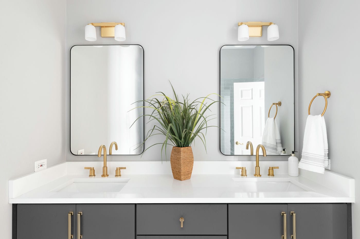 bathroom with grey cabinet